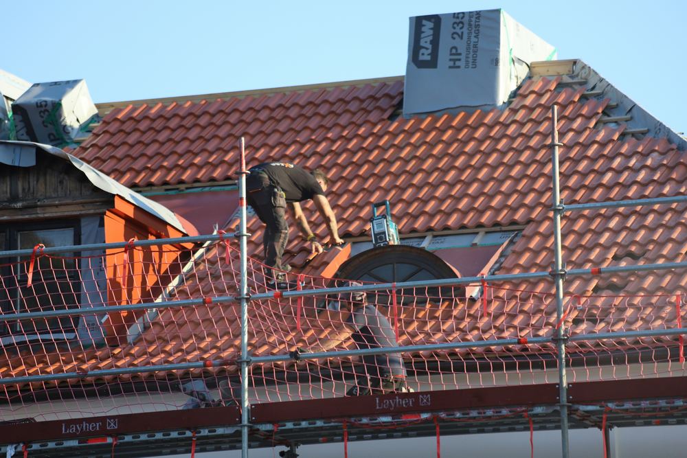 Roofer working on a residential roof