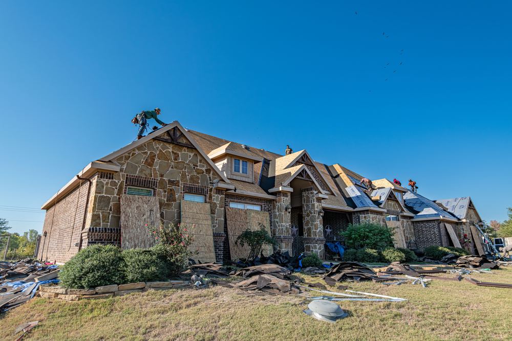 Brick home during a roof replacement